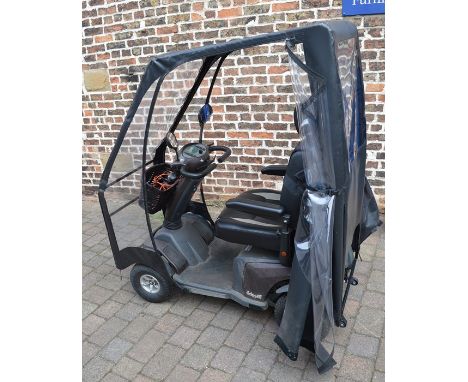Galaxy II mobility scooter with rain cover