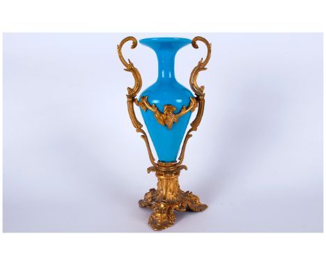 Ormolu Mounted Blue Glass Vase, a small baluster glass vase with flared rim, in St Patrick's blue, ormolu mounted in a tripod