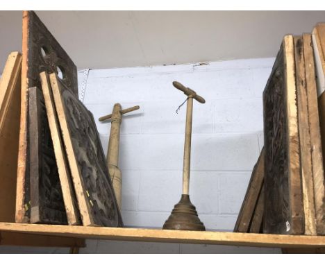 Various carved panels and a poss stick