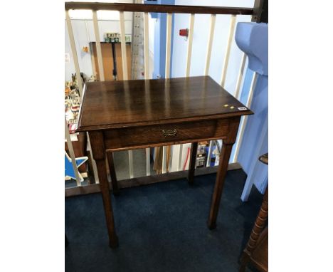 A small oak side table, with single drawer