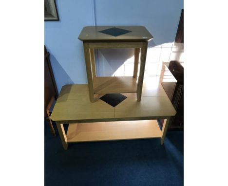 A light oak coffee table and a small table
