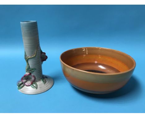 A Clarice Cliff circular bowl with concentric bands and a candlestick (2)