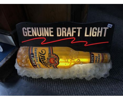 An illuminated Miller Light sign