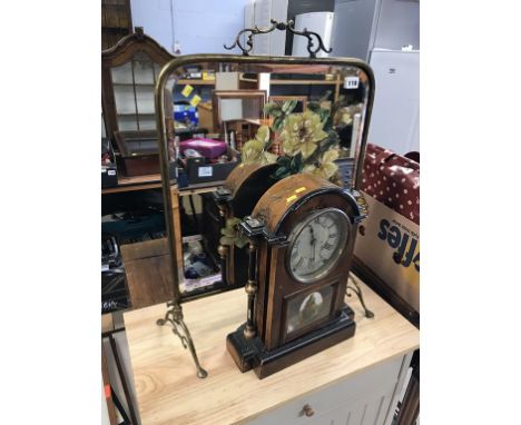Fire screen and a mantle clock