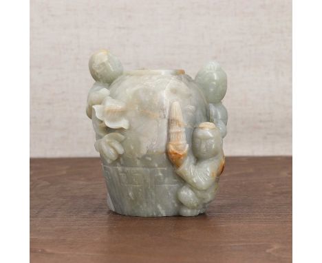 A Chinese jade carving,20th century, of three boys clambering over a large jar,10cm highCondition ReportCracks and inclusions