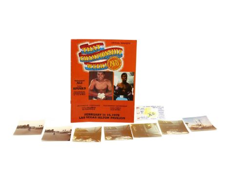 A collection of items relating to Muhammad Ali vs Leon Spinks,comprising a ticket from the Ali vs Spinks fight at Las Vegas H
