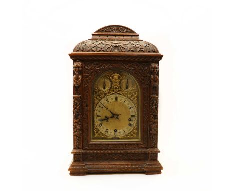 A Victorian oak bracket clock,c.1860, with a brass movement labelled C.T. Cowell Douglas, with a silvered chapter ring with R