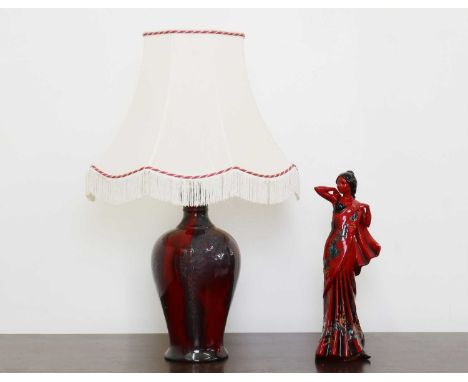 A Royal Doulton Flambe 'Eastern Grace',modelled by Pauline Parsons, HN 3683, No. 1394, 32cm high,together with a Royal Doulto