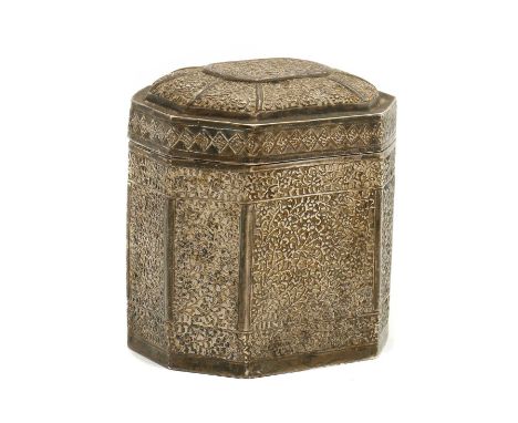 An Indian silver tea caddy,late 19th to early 20th century, with dense foliate repousse decoration,9.5cm wide8cm deep10.5cm h