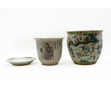 A Chinese jardiniere with a stand, 20th century, decorated with ladies and boys between inscriptions, 27cm high, anda famille