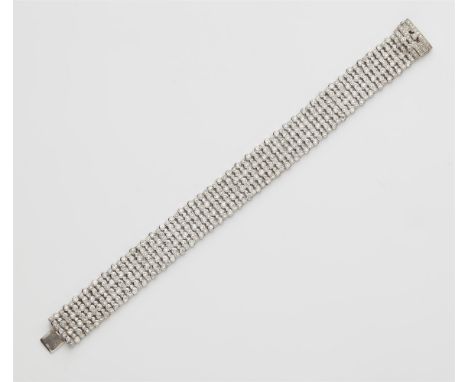Armband mit Diamanten18 kt Gelbgold, rodiniert. Geschmeidiges Band und bombierte Rechteckschließe mit 533 zargengefassten kle