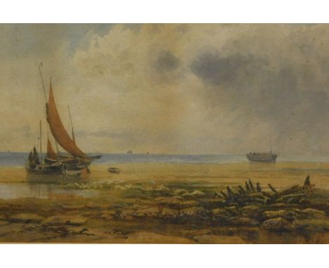John Carlisle (b.1834). Seascape, boats drying sails on a shore with clouds gathering, watercolour, signed and dated 1874, 24