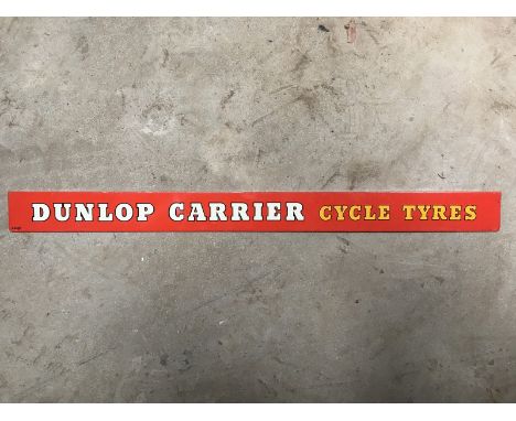 A Dunlop Carrier Cycle Tyres shelf strip, in excellent condition.