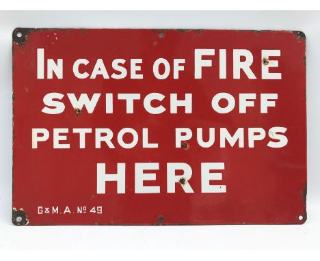 A rectangular red and white enamel sign - 'In case of fire switch off petrol pumps here', marked G & MA no. 49, 15 x 10".