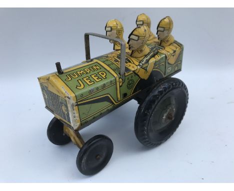 An unusual clockwork tinplate model of 'Jumpin Jeep' by Marx.