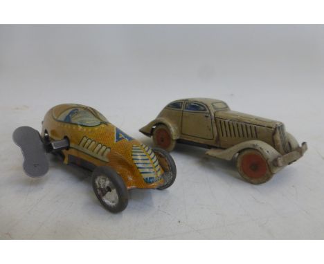 A Marx Toys clockwork tinplate single seater racing car and one other. 