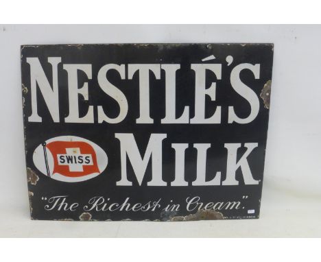 A Nestle's Milk 'The Richest in Cream' rectangular enamel sign, 24 x 18".
