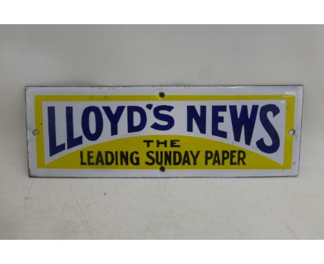 A Lloyd's News rectangular enamel finger plate in mint condition, 9 x 3".
