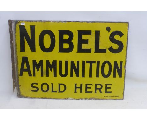 A Nobel's Ammunition Sold Here double sided enamel sign with hanging flange by the Falkirk Iron Company, 21 x 15".