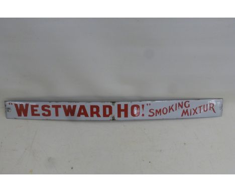 A 'Westward Ho!' Smoking Mixtur rectangular enamel strip, in very good condition, 24 x 2".