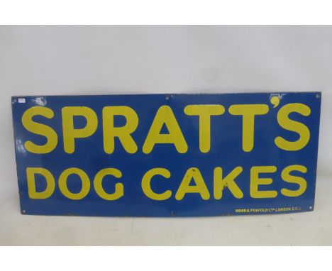 A Spratt's Dog Cakes rectangular enamel sign by Wood and Penfold Limited London, in good condition, 30 x 12".