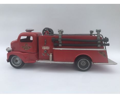 A first generation 'cab-over'- Tonka tinplate fire engine.