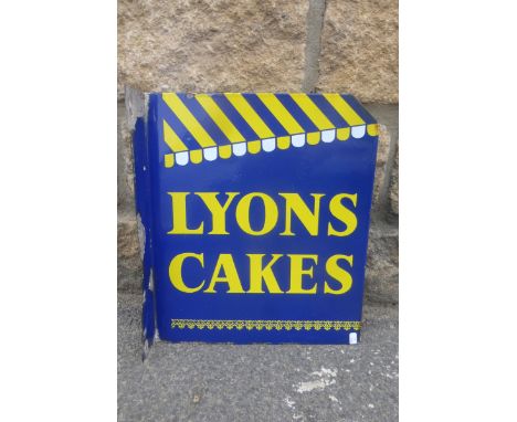 A Lyons Cakes double sided enamel sign of unusual design with "awning" to both sides, the sign in excellent condition, 12 x 1