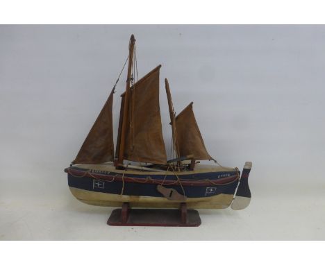 A small scale model of a boat.