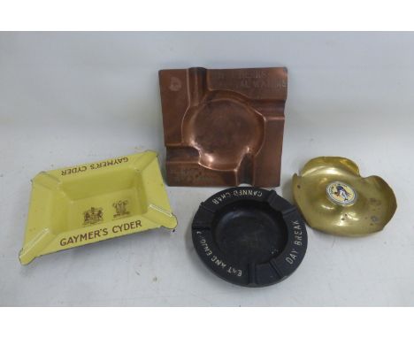 A Gaymer's Cyder enamel ashtray, a Royal Berks Mineral Waters copper ashtray, a Cutler Palmer brass ashtray with central porc
