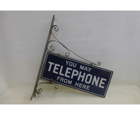 A double sided enamel sign - You may telephone from here, in excellent condition, set within a metal frame.