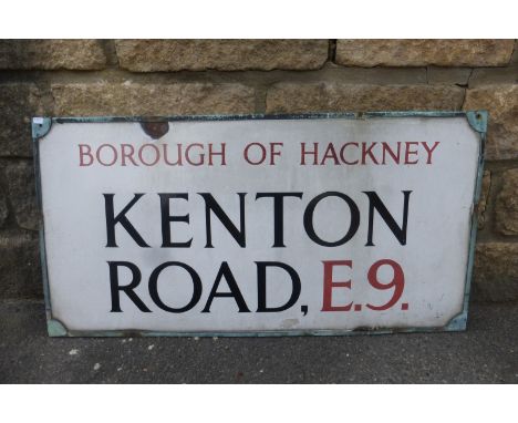 A Borough of Hackney Kenton Road E9 enamel street sign in brass frame, 2 1/4 x 16 1/2".