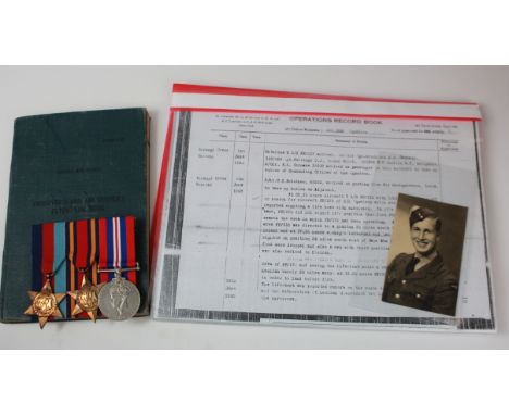 RAF WW2 coastal command W/Op Log book with 1939-45 Star ,Burma Star and War medals with portrait photo and large amount of re