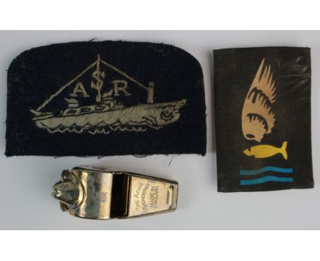 Badge an RAF printed Goldfish club cloth badge with an AM marked Dinghy whistle & an ASR patch.