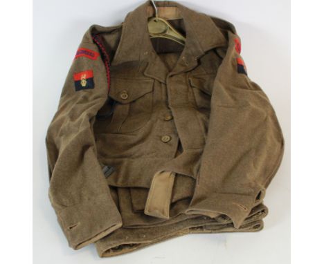 Battle dress blouse and trousers scarce 1946 pattern complete with re titles dive patches Sgt stripes in good condition.