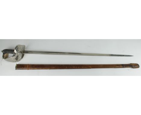 Sword - 1897 Pattern Officers QE2. Sword in good condition but the leather on the scabbard is in poor condition.