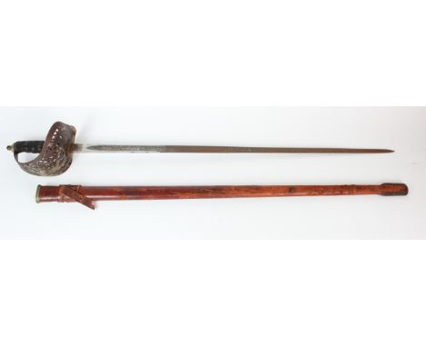 Sword GV 1897 pattern Infantry Officers in its leather covered scabbard.
