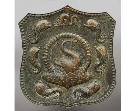 A Newlyn School style Arts & Crafts copper shield, probably J & F Poole of Hayle, Cornwall
The shaped shield embossed with va