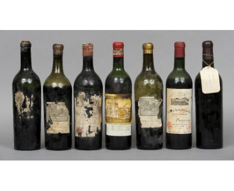 Seven various bottles of red wine
Comprising: Chateau Mouton Rothschild Grand Vin, unknown vintage; Berry Brothers & Co. Grua