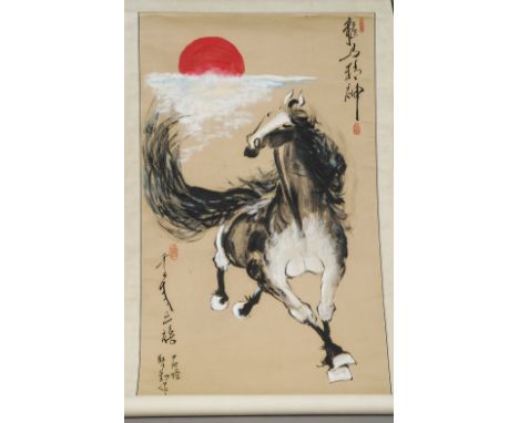 A Chinese scroll painting
Worked with a horse and sunset, variously signed, inscribed and with red seal marks.  61 x 170 cm o