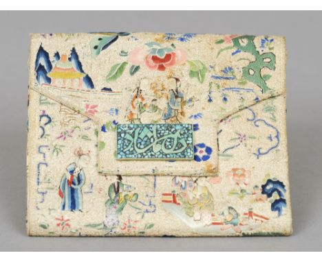 A Chinese silkwork purse
Decorated with figures in a continuous garden with applied green stone plaque.  18 cm wide. CONDITIO