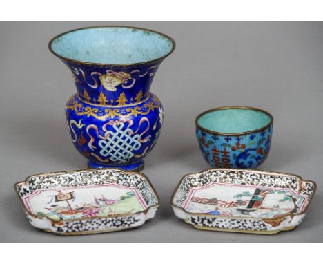 A Chinese Canton enamel decorated vase
Painted with precious objects; together with a Canton enamel wine cup; and two saucers