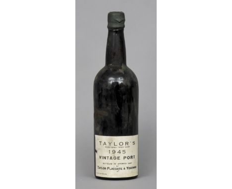 Taylor's Vintage Port 1945
Single bottle with wax seal. CONDITION REPORTS: MId neck level, some scuffing and staining to labe