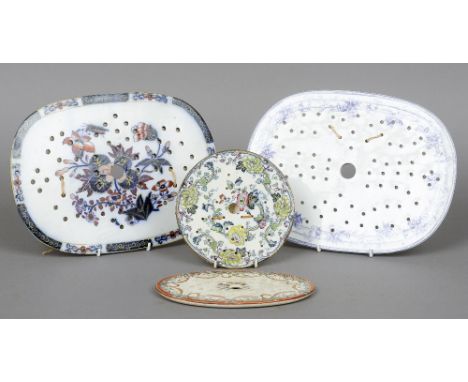 A Victorian Wedgwood drainer
Decorated in the Peace pattern; a Copeland, late Spode drainer; and another drainer decorated in