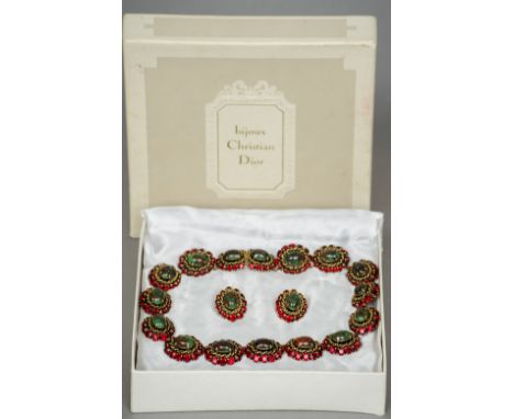 A Christian Dior necklace and earrings en suite
The clasp stamped Made in Germany for Christian Dior 1964, in Bijoux Christia