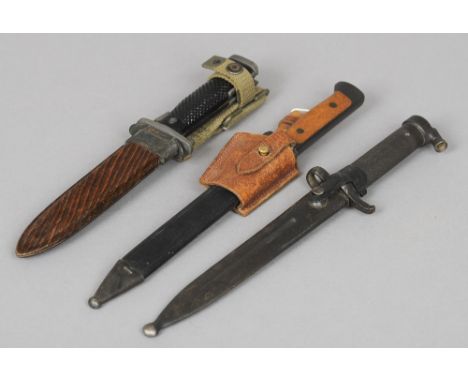 A Swedish M/1896 bayonet and scabbard by Eskilstuna Jernmanufaktur Aktie Bolag
Variously stamped; together with a Danish M/62