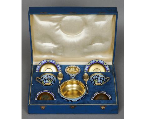 A Russian silver gilt and champleve enamel tea set, with 916 Zolotnik Post 1958 Kokoshnik mark and maker's mark of DY in cyri