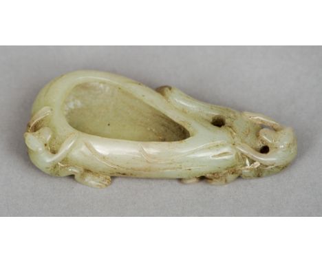 A Chinese carved jade brush washer
Worked as a fruit with two monkeys.  9 cm long. CONDITION REPORTS: Generally in good condi