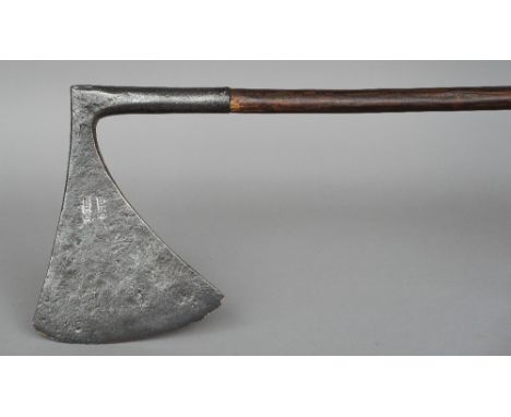 A 17th/18th century headsman's axe
With flaring blade of flattened wedge shaped section, stamped twice with blacksmith's mark