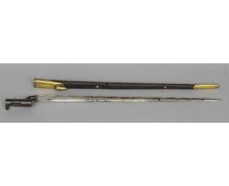 A 19th Century British Army Enfield-Martini bayonet 
With brass mounted leather scabbard, with hollow ground triangular blade