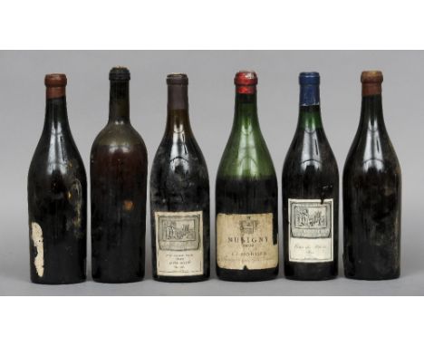 Six various bottles of red and white wine
Comprising: Berry Brothers & Co. Cote-Rotie 1er Cru 1929; Musigny 1906; Berry Broth